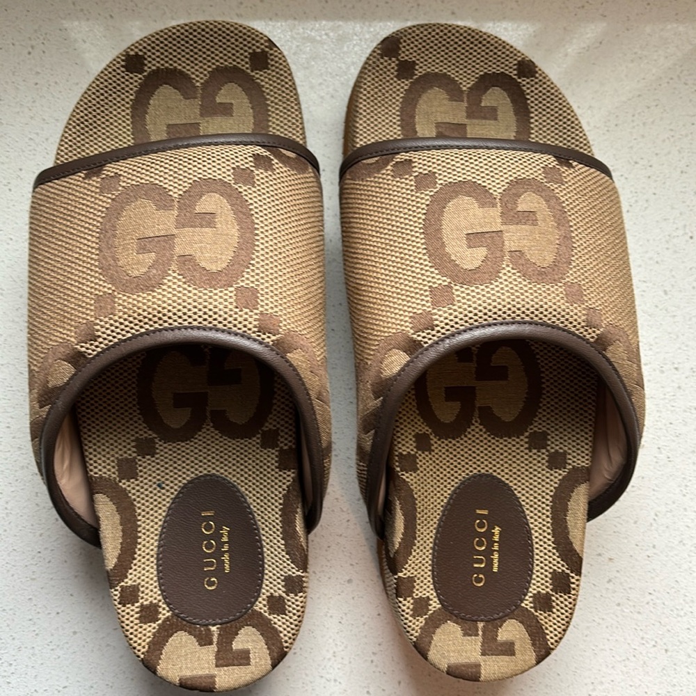 Gucci Flatforms 
Used only once. 

Runs like Size 8